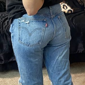 Medium wash distressed levi jeans